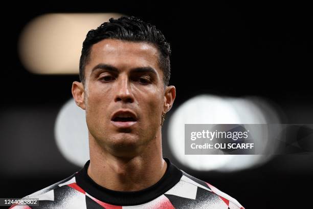 Manchester United's Portuguese striker Cristiano Ronaldo reacts during the warm up prior to the English Premier League football match between...