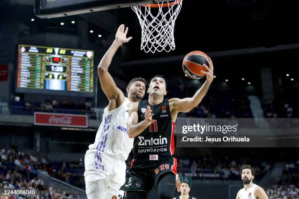 Kostas Sloukas, #11 of Olympiacos Piraeus and Walter Tavares, #22 of Real Madrid in action during the 2022/2023 Turkish Airlines EuroLeague Regular...