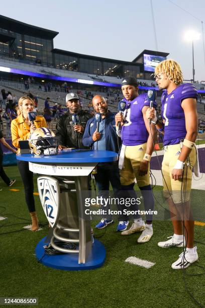 Washington players Michael Penix Jr and Rome Odunze do an interview with the Pac-12 Network after a college football game between the Washington...
