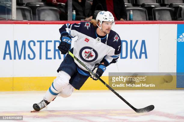 Axel Jonsson-Fjallby of the Winnipeg Jets skates prior to the game against the Colorado Avalanche at Ball Arena on October 19, 2022 in Denver,...