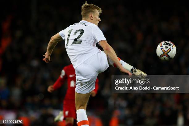 West Ham United's Flynn Downes in action during the Premier League match between Liverpool FC and West Ham United at Anfield on October 19, 2022 in...