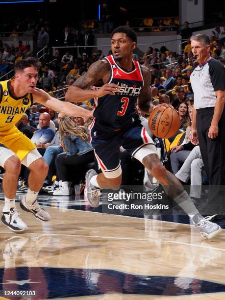 Bradley Beal of the Washington Wizards drives to the basket against the Indiana Pacers on October 19, 2022 at Gainbridge Fieldhouse in Indianapolis,...
