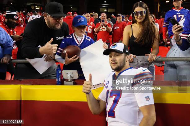 Buffalo Bills quarterback Josh Allen poses for a picture with fans after an NFL game between the Buffalo Bills and Kansas City Chiefs on October 16,...