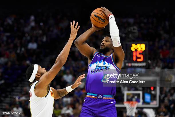 Malik Beasley of the Utah Jazz shoots over Bruce Brown of the Denver Nuggets at Vivint Arena on October 19, 2022 in Salt Lake City, Utah. NOTE TO...