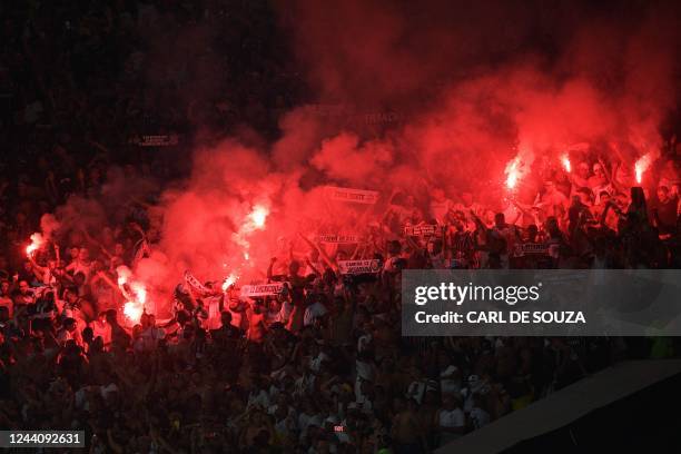 Fans of Corinthians celebrate after Giuliano's goal against Flamengo during the Brazil Cup final second leg football match between Flamengo and...