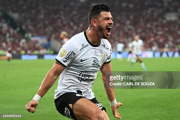Corinthians' Giuliano celebrates after scoring against Flamengo during the Brazil Cup final second leg football match between Flamengo and...