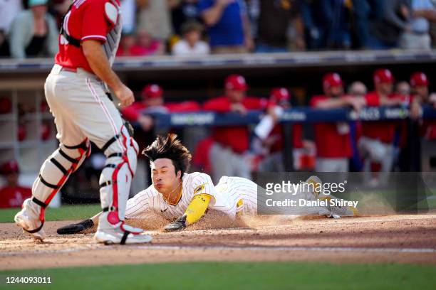 Ha-Seong Kim of the San Diego Padres runs home to score in the fifth inning of Game 2 of the NLCS between the Philadelphia Phillies and the San Diego...