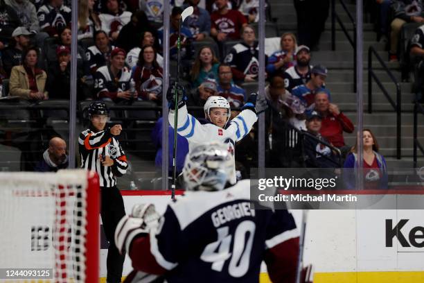 Neal Pionk of the Winnipeg Jets celebrates the game-winning goal against the Colorado Avalanche at Ball Arena on October 19, 2022 in Denver, Colorado.