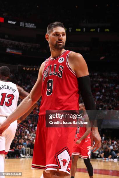 Nikola Vucevic of the Chicago Bulls looks on during the season opener game against the Miami Heat on October 19, 2022 at FTX Arena in Miami, Florida....