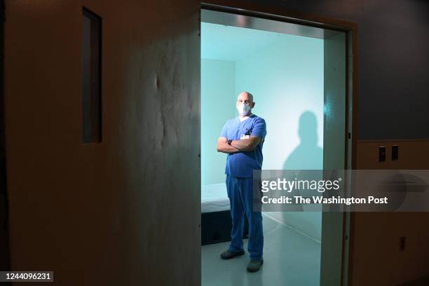 Dr. Jeffrey P. Sternlicht poses for a portrait in an observation room used for patients that often have psychiatric needs at Greater Baltimore...