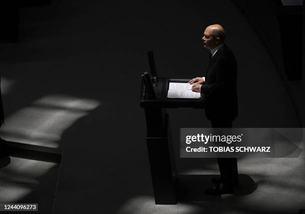 German Chancellor Olaf Scholz addresses members of the Bundestag in Berlin on October 20 ahead of a EU summit.