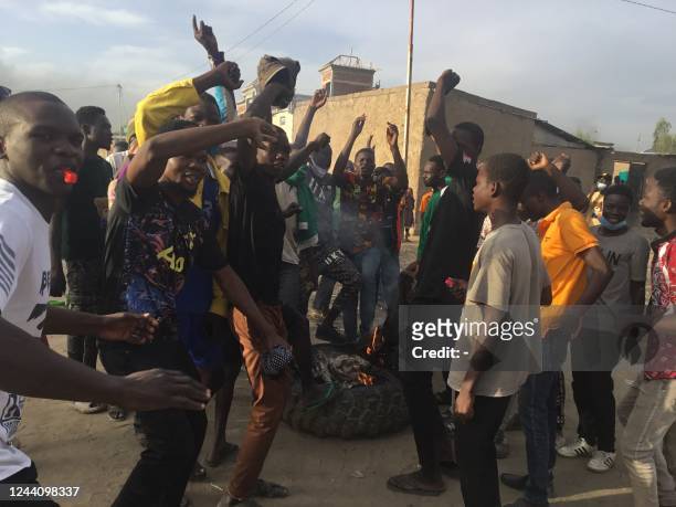 Demonstrators shout slogan during a protest in NDjamena on October 20, 2022. - Clashes erupted in the Chadian capital N'Djamena between police and...