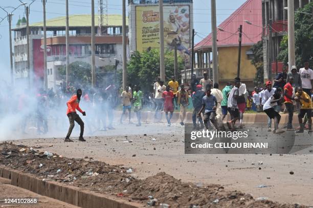 Protestors throw rocks and block roads after the outlawed opposition group, The National Front for the Defence of the Constitution , called for...