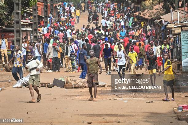Protestors throw rocks and block roads after the outlawed opposition group, The National Front for the Defence of the Constitution , called for...