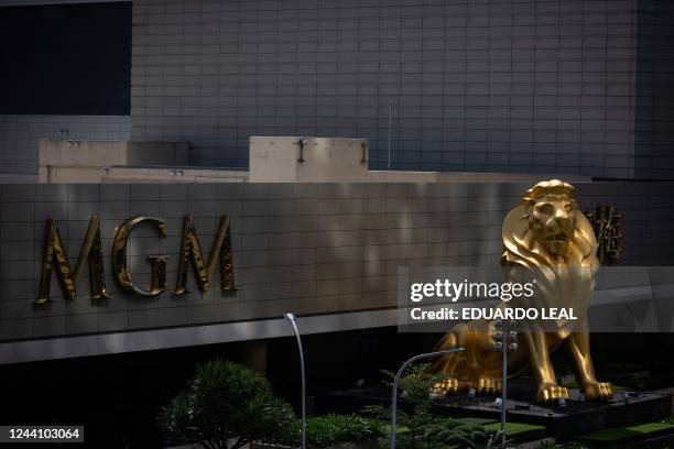 This photograph taken on October 20, 2022 shows the lion symbol of MGM outside the company casino resort at the Cotai Strip in Macau.