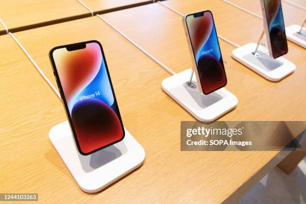 iPhone 14 on display inside Apple store in Marunouchi, Tokyo. News ...