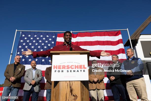 Georgia Republican Senate nominee Herschel Walker addresses the crowd of supporters during a campaign stop on October 20, 2022 in Macon, Georgia....