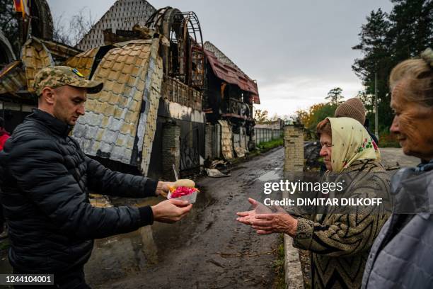 Local residents receive food and humanitarian aid in Svyatohirs'k, Donetsk region, on October 20 after the liberation of the area.