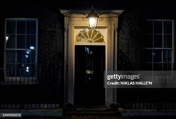 The closed front door to 10 Downing Street is pictured in central London, on October 20 hours after UK's Prime Minister Liz Truss resigned as leader...