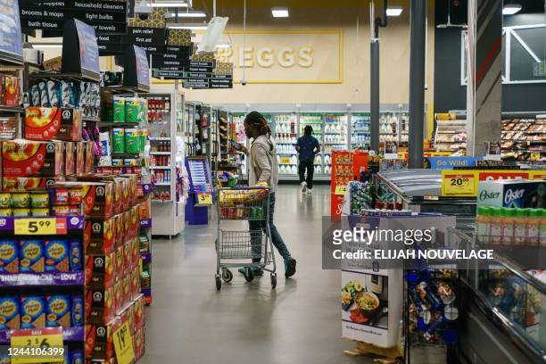 Shoppers are seen in a Kroger supermarket on October 14 in Atlanta, Georgia. - Economic prospects are becoming "more pessimistic" in the United...