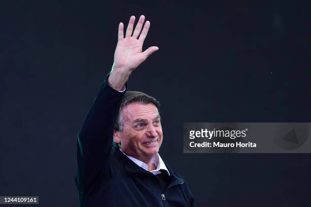 President of Brazil and presidential candidate Jair Bolsonaro waves to supporters during a rally organized by Liberal Party as part of the campaign...