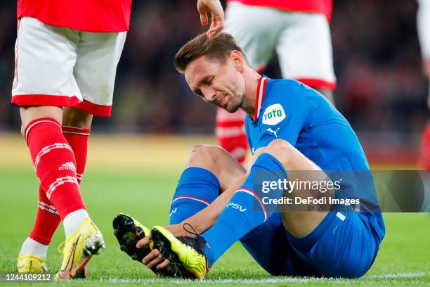 Luuk de Jong of PSV Eindhoven injured during the UEFA Europa League group A match between Arsenal FC and PSV Eindhoven at Emirates Stadium on October...