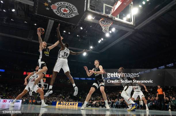 Danilo Andjusic of Partizan Mozzart Bet in action against Marco Belinelli and Mam Jaiteh of Virtus Segafredo during the 2022/2023 Turkish Airlines...