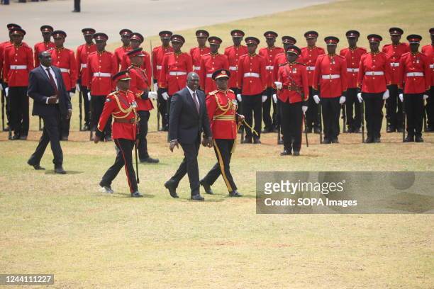 President William Ruto with the Chief of Defence Forces, General Robert Kibochi walk back to their seats after inspecting a guard of honour mounted...