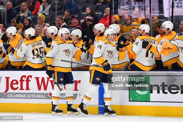 Tanner Jeannot of the Nashville Predators celebrates after scoring a goal during the first period of a game against the Columbus Blue Jackets at...
