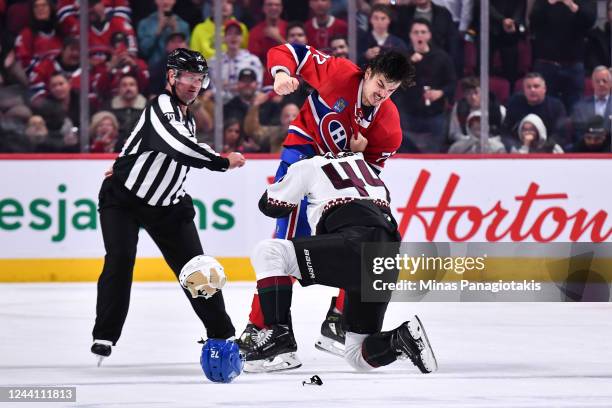 Arber Xhekaj of the Montreal Canadiens fights with Zack Kassian of the Arizona Coyotes during the first period at Centre Bell on October 20, 2022 in...