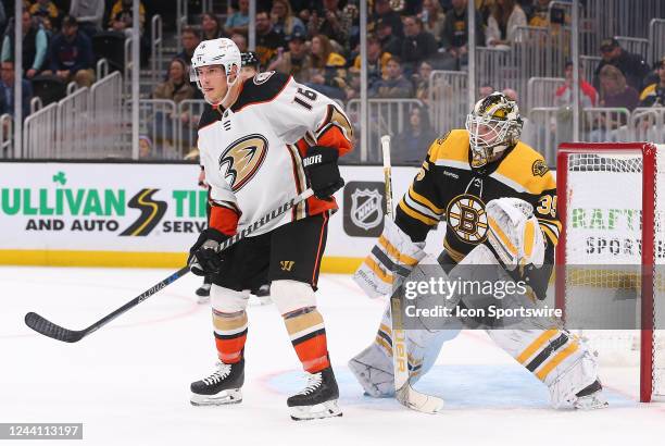 Boston Bruins goalie Linus Ullmark peeks around the shoulder of Anaheim Ducks center Ryan Strome during a NHL game between Anaheim Ducks and Boston...