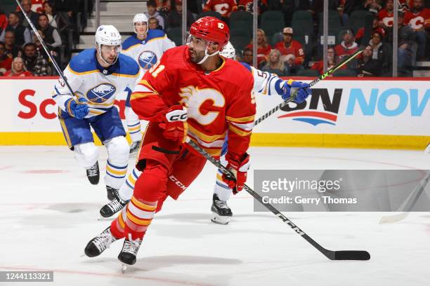 Nazem Kadri of the Calgary Flames skates up ice against the Buffalo Sabres at Scotiabank Saddledome on October 20, 2022 in Calgary, Alberta, Canada.