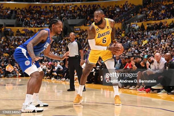 LeBron James of the Los Angeles Lakers looks to pass the ball during the game against the LA Clippers on October 20, 2022 at Crypto.com Arena in Los...