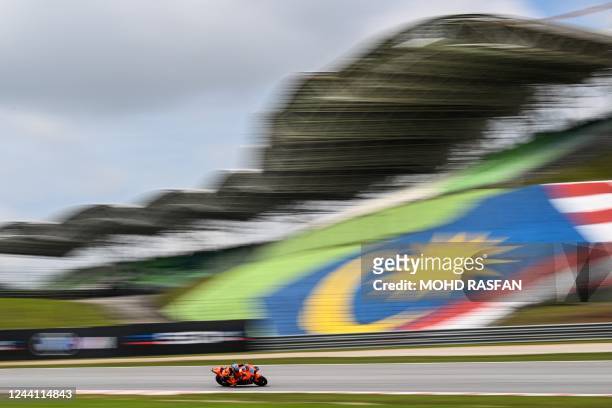 Tech3 KTM Factory Racing's Australian rider Remy Gardner steers his bike during the first MotoGP free practice at the Sepang International Circuit on...