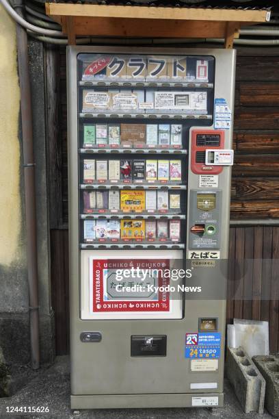 Photo taken on Sept. 12 shows a recycled cigarette vending machine that was repurposed to sell artworks by local craftspeople in the town of Uchiko,...