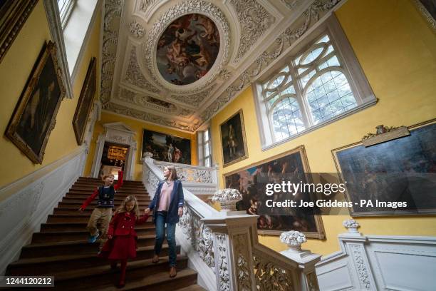 Sarah Edwards and her children George and Martha explore the Children's Country House at Sudbury, Ashbourne, launched by the National Trust. Created...