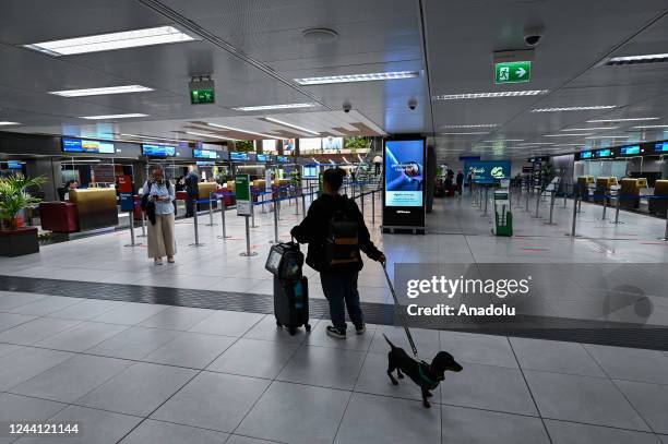 Passengers wait at Milan Linate Airport in Milan, Italy on October 21, 2022 as union called a 24h general strike of the aviation sector, including...