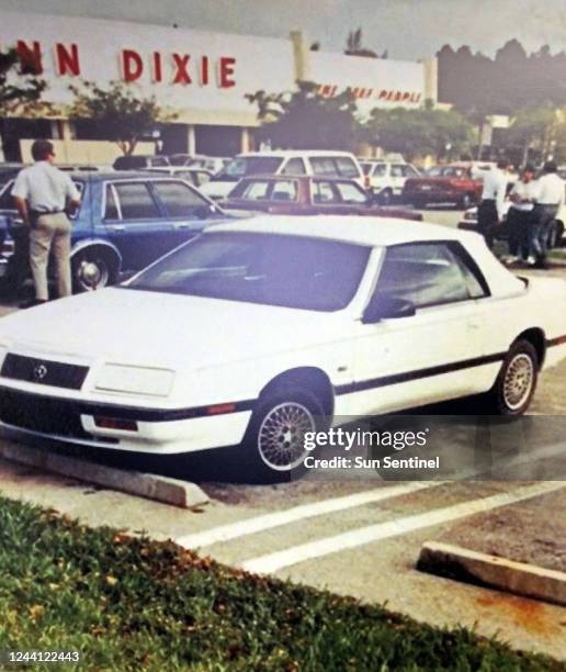 Photograph of the white convertible Chrysler LeBaron that was allegedly used in the &quot;killer clown&quot; murder from 1990 was on display during a...