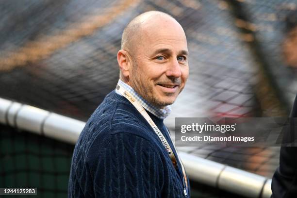 Senior Vice President, general manager Brian Cashman of the New York Yankees looks on prior to Game 3 of the American League Division Series against...