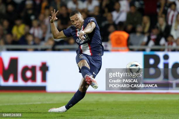 Paris Saint-Germain's French forward Kylian Mbappe shoots to score a goal during the French L1 football match between AC Ajaccio and Paris...