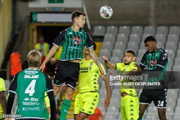 Cercle's Boris Popovic, Charleroi's Mehdi Boukamir, Charleroi's Adem Zorgane and Cercle's Jean Harisson Marcelin fight for the ball during a soccer...