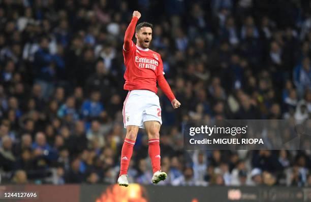 Benfica's Portuguese midfielder Rafa Silva celebrates after scoring his team's first goal during the Portuguese league football match between FC...