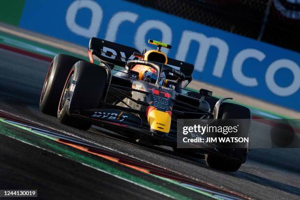 Red Bull Racing's Mexican driver Sergio Perez takes a turn during the second practice session for the Formula One United States Grand Prix practice...