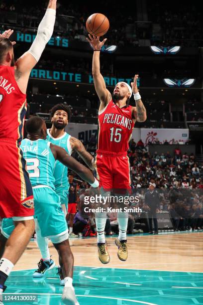 Jose Alvarado of the New Orleans Pelicans shoots the ball during the game against the Charlotte Hornets on October 21, 2022 at Spectrum Center in...
