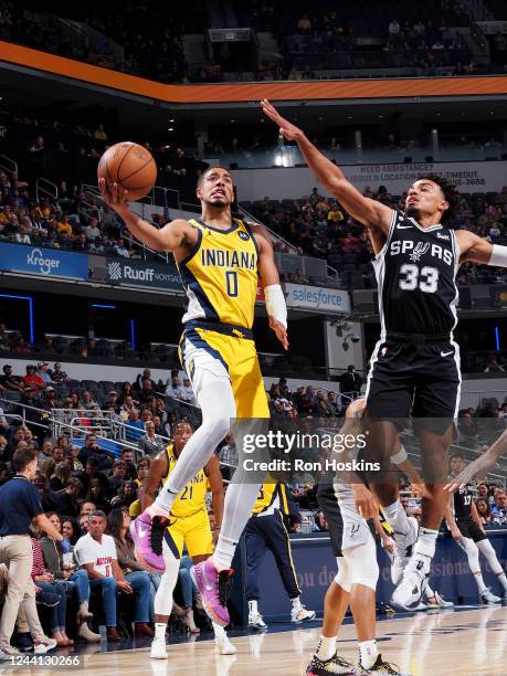 Tyrese Haliburton of the Indiana Pacers drives to the basket against the San Antonio Spurs on October 21, 2022 at Gainbridge Fieldhouse in...