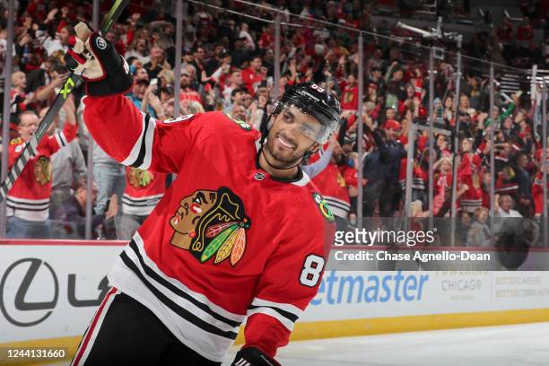 Andreas Athanasiou of the Chicago Blackhawks celebrates after scoring his penalty shot against the Detroit Red Wings in the second period at United...