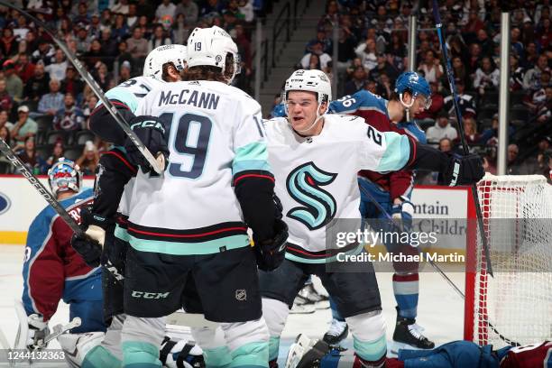 Yanni Gourde, Jared McCann and Karson Kuhlman of the Seattle Kraken celebrate a goal against the Colorado Avalanche at Ball Arena on October 21, 2022...