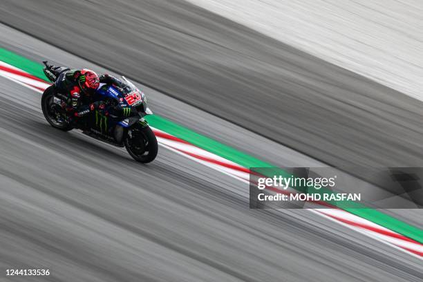 Monster Energy Yamaha MotoGP's French rider Fabio Quartararo speeds after taking a corner during the third MotoGP free practice at the Sepang...