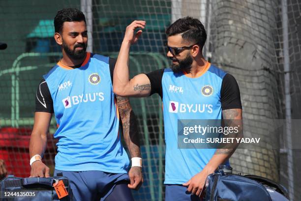 India's Virat Kohli and India's KL Rahul interact during a practice session ahead of their ICC mens Twenty20 World Cup 2022 cricket match against...