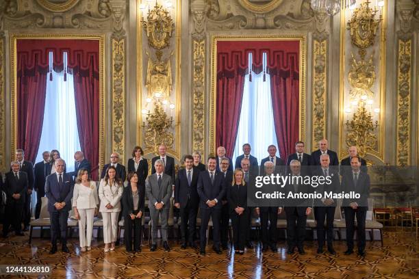 Italian President Sergio Mattarella and Italian Prime Minister Giorgia Meloni pose for a group photo with the 24 members of Italy's new government,...